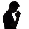 Black and white silhouette portrait of an pensive man with leaning his hand on forehead in stress, guy face profile on a white Royalty Free Stock Photo