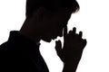 Black and white silhouette portrait of an pensive man with leaning his hand on forehead in stress, guy face profile on a white Royalty Free Stock Photo