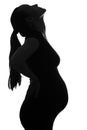 Black and white silhouette portrait of pregnant woman, head tilted up on white background Royalty Free Stock Photo