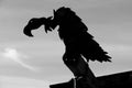 Black and white silhouette of a vulture on a gallows. Calico, California