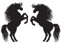 Black and white silhouettes of two cartoon horses