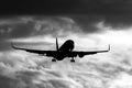 Black and white silouette image of a 767 landing on runway 09 at EMA airport England. - stock photo Royalty Free Stock Photo