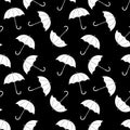 Black and white simple umbrellas silhouettes, seamless pattern, vector