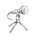 Black and white sketch of a desktop microphone