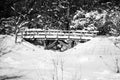 Black and white snow scene with bridge. Royalty Free Stock Photo