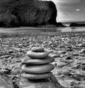 Black and white stacking stones on the beach