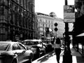 Black and white street photo of tourist in Vienna, Austria