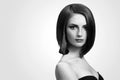 Black and white studio shots of a classy young woman with short Royalty Free Stock Photo