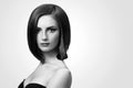 Black and white studio shots of a classy young woman with short Royalty Free Stock Photo