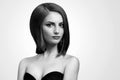 Black and white studio shots of a classy young woman with short Royalty Free Stock Photo