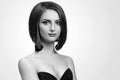 Black and white studio shots of a classy young woman with short Royalty Free Stock Photo