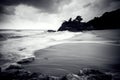 Black and white stunning white wave flow hitting the sandy beach Royalty Free Stock Photo