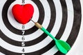 Black white target with dart in heart love symbol as bullseye Royalty Free Stock Photo