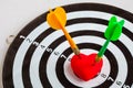 Black white target with two darts in heart love symbol as bullseye Royalty Free Stock Photo