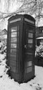 Black and White Telephone box in the snow Royalty Free Stock Photo