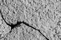 Black and white texture of a concrete wall with a crack Royalty Free Stock Photo