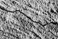 Black and white texture of a concrete wall with a crack Royalty Free Stock Photo