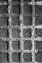Black and white texture of metal plate with embossed square patterns Royalty Free Stock Photo