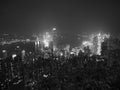 Black and white tone Hong Kong the scenes, victoria harbour from the peak bird view, in the mist with bad weather in the night, Royalty Free Stock Photo