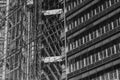 Black and white tone, outdoor exterior view of futuristic building`s glass facade of modern office buildings. Royalty Free Stock Photo