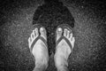 Black and white of Top view feet in sandals selfie shot of asian