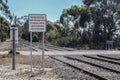 black and white Trains Must Not Pass This Sign Until Flashing Lights Have Operated For 25 Seconds warning sign to train drivers Royalty Free Stock Photo