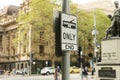 A black and white Tram Only sign on the corner of Swanston and Collins Streets in Melbournes CBD