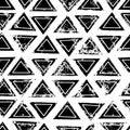 Black and white triangles aged geometric ethnic grunge seamless pattern, vector Royalty Free Stock Photo