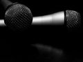 Black and white two microphones concept Royalty Free Stock Photo