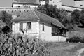 Black and white. Typical rural peasant houses in the village Alma Vii Almen Transylvania, Romania. Royalty Free Stock Photo