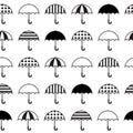 Black and white umbrellas icons seamless pattern. Vector illustration.