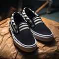 Black And White Vans Slip Ons With Stripes - Stylish And Comfortable Footwear