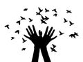 Black and white vector illustration depicting hands, letting out a flock of birds.