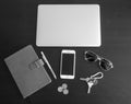 Black and white version of Business office workspace with Various items isolated on a black desk background Royalty Free Stock Photo