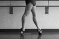 Black and white version of Fourth position at the barre in Jazz Class Royalty Free Stock Photo