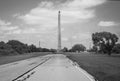 A black and white view down the entrance road leading to the San Jacinto Monument. Royalty Free Stock Photo