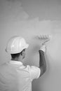 Black and white view of man holding paint roller Royalty Free Stock Photo