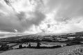 Black and White view of Pastures and Clouds