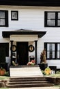 Black And White Vintage House Porach-entrance Decorated For Halloween With Real And Decorative Pumpkins