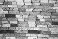 Black and white wall of tiles of various uneven tile wall Royalty Free Stock Photo