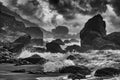 Black and white of the waves of Muir Beach in California crashing against the rocky shoreline Royalty Free Stock Photo