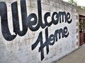Black and white welcome home sign