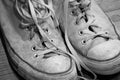 Close up oblique view of dirty worn sneakers Royalty Free Stock Photo