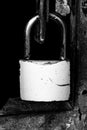 White wooden door chained closed by two padlocks, Cape Town, South Africa