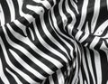 Black and White Zebra Stripe Patterned Textile with Soft Folds Texture Royalty Free Stock Photo