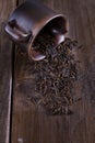 Black wild rice in a ceramic bowl on a rustic wooden background Royalty Free Stock Photo