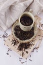 Black wild rice in a rustic ceramic plate on a white wooden background Royalty Free Stock Photo