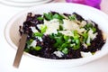 Black wild rice with scallions and parmigiano