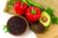 Black wild rice in wooden bowl and fresh vegetables Royalty Free Stock Photo