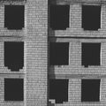 Black windows of an abandoned building Royalty Free Stock Photo